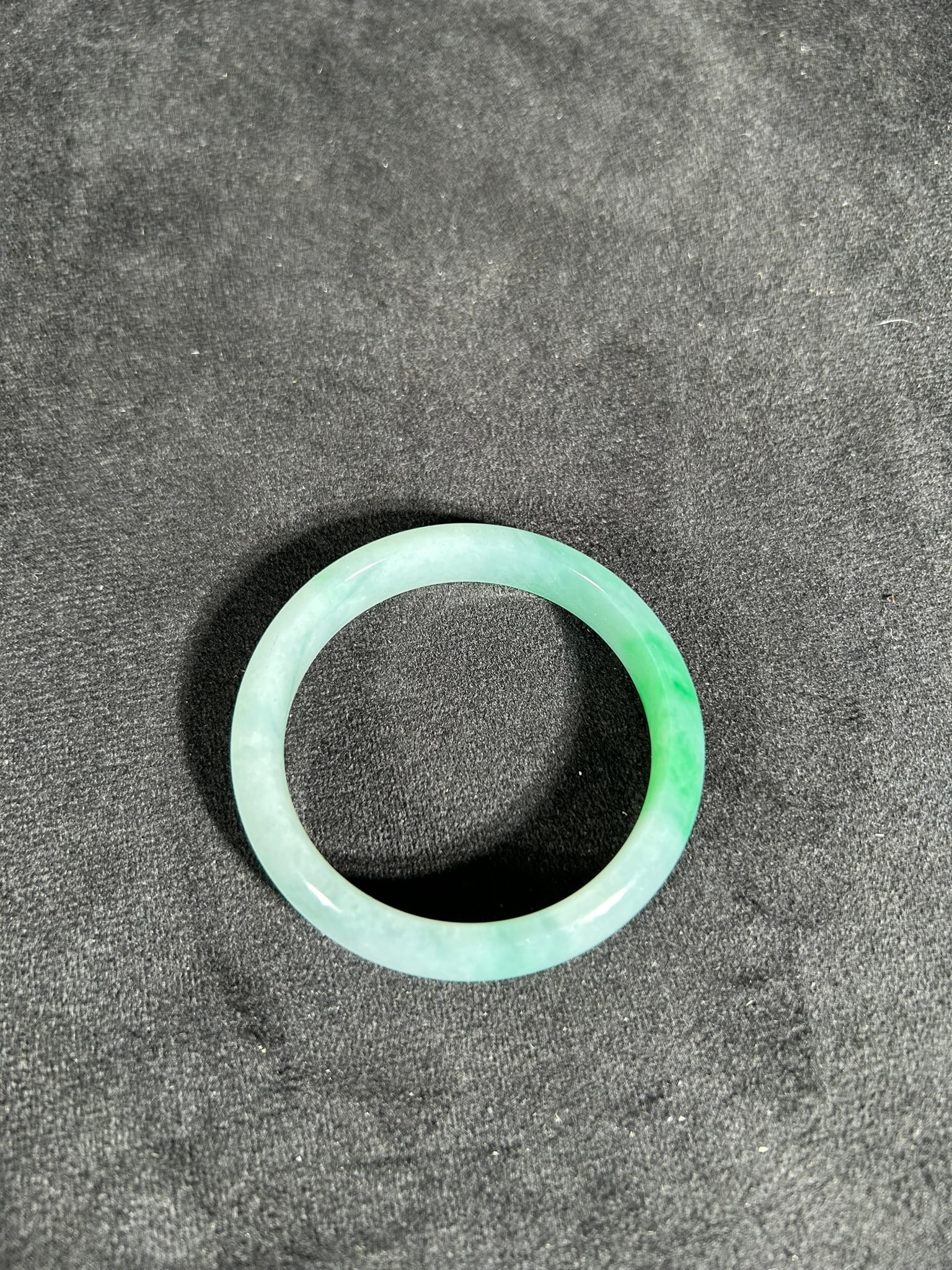 A Chinese Pale Celadon Jadeite Bangle (1 of 2)