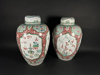 A Pair of Sotheby's Chinese Iron-Red-Ground Famille-Verte 'Birds and Antiques' Ovoid Jars and