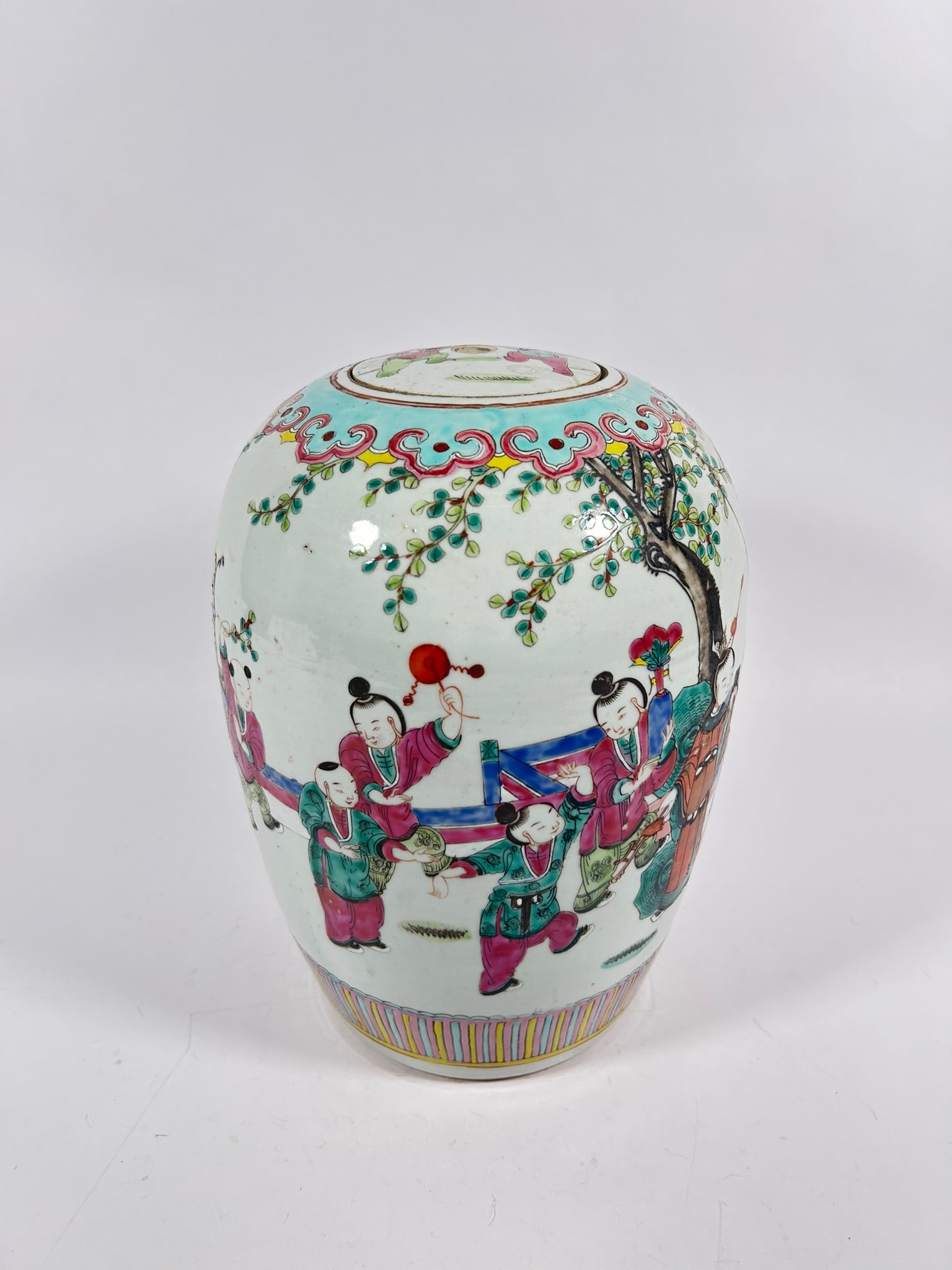 A Chinese Famille Rose 'Boys' Jar and Cover: 11.5 in. high, 8 in. wide.