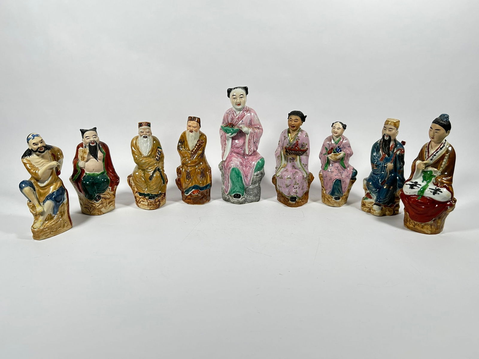 A Group of Nine Porcelain Figures of 'Eight Immortals' (1 of 18)