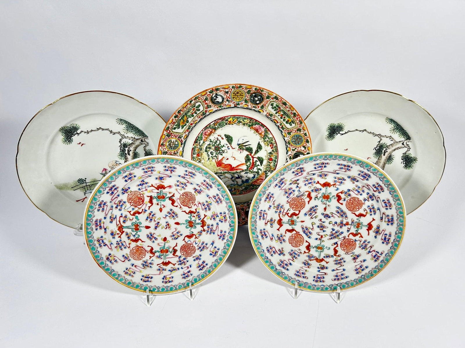 A Group of Five Chinese Porcelain Dishes: Comprising two famille rose 'fu lu shou' dishes, with apocryphal Qianlong six-character mark in iron-red to the bottom, the smaller one measures 8.7/8 in. (22.5 cm.) diam, the larger one measures 9.1/