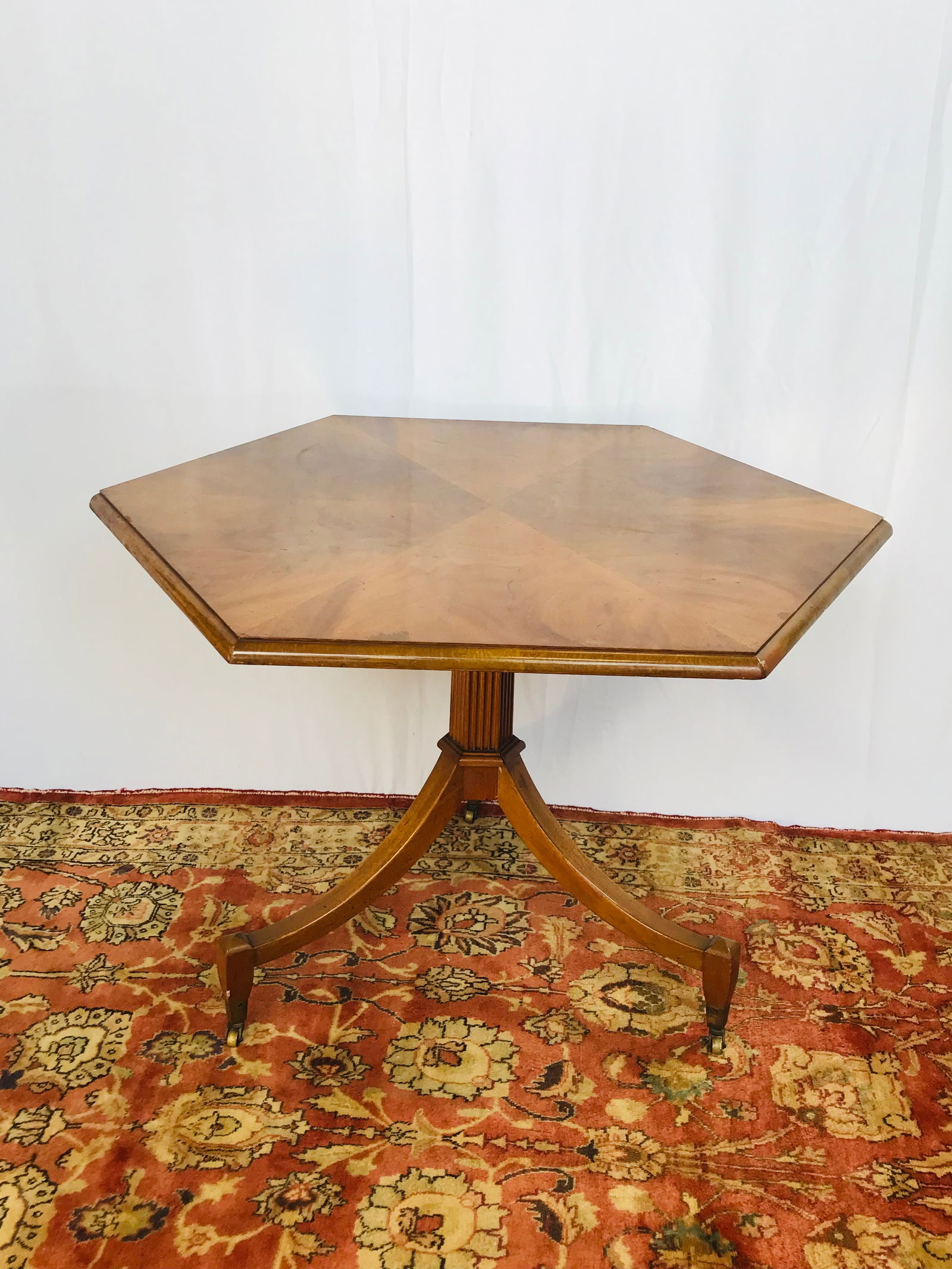 A Beacon Hill Collection Hexagon Table with Rollers (1 of 8)
