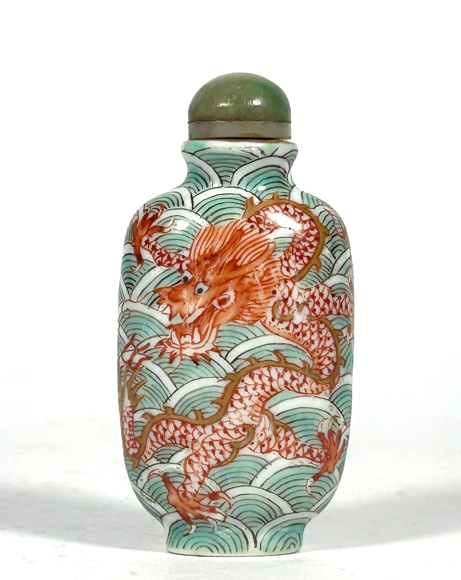 A Chinese Red and Green Decorated 'Dragon' Snuff Bottle, Qianlong Four-Character Mark (1 of 8)