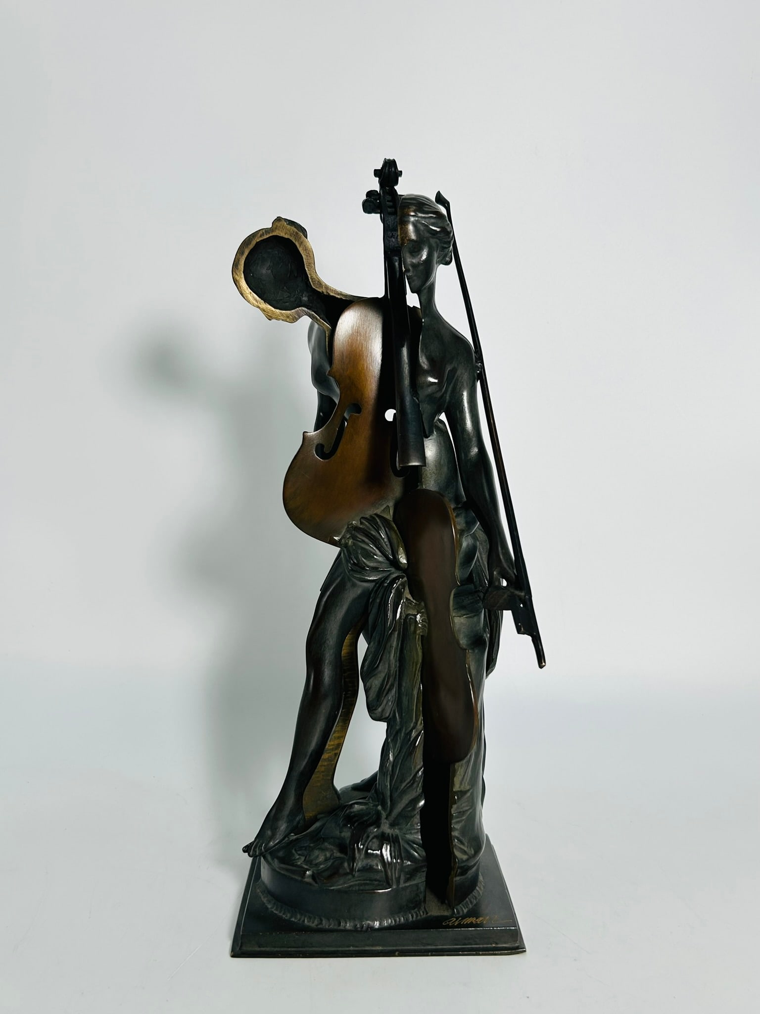 A Bronze Sculpture of Venus au Violoncelle, With a Signature Arman: The sculpture bearing incised signature and numbered 4/99. Fernandez Arman (Armand Pierre Fernandez), born in 1928 in Nice, was a French-American sculptor and artist. Influenced by his father?s passio