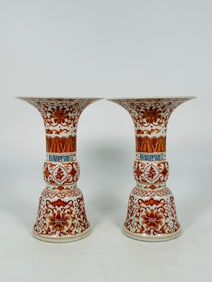 A Pair of Chinese Iron-Red Decorated Gu-Form Vases, Qianlong Six-Character Marks