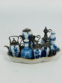 A Set of Nine Chinese Blue and White Seasoning and Spice Dispenser, Kangxi Period, Qing Dynasty