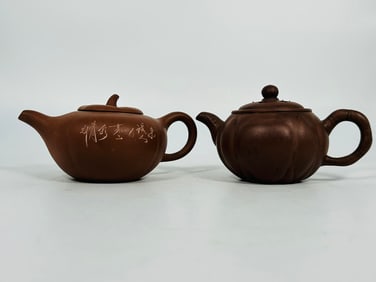 Two Chinese Yixing Teapots and Covers