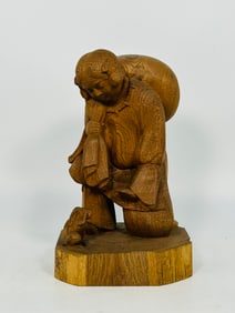 A Japanese Carved Wood Figure of a Lady and a Rabbit