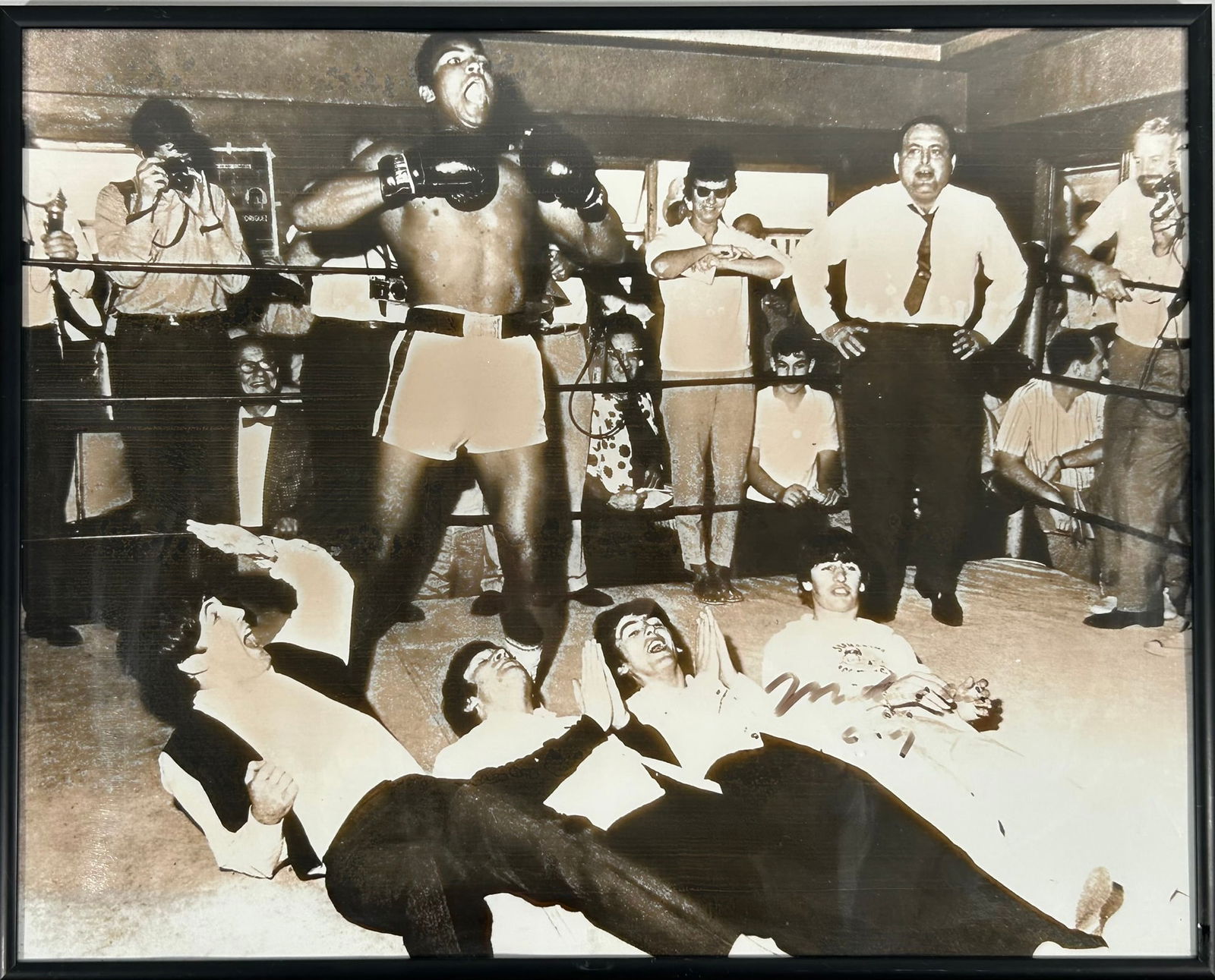 A Photo Print of Muhammad Ali Over The Beatles, with a Signature Muhammad Ali (1 of 4)