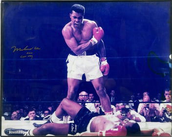 A Photo Print of Muhammad Ali VS Sonny Liston, with a Signature Muhammad Ali