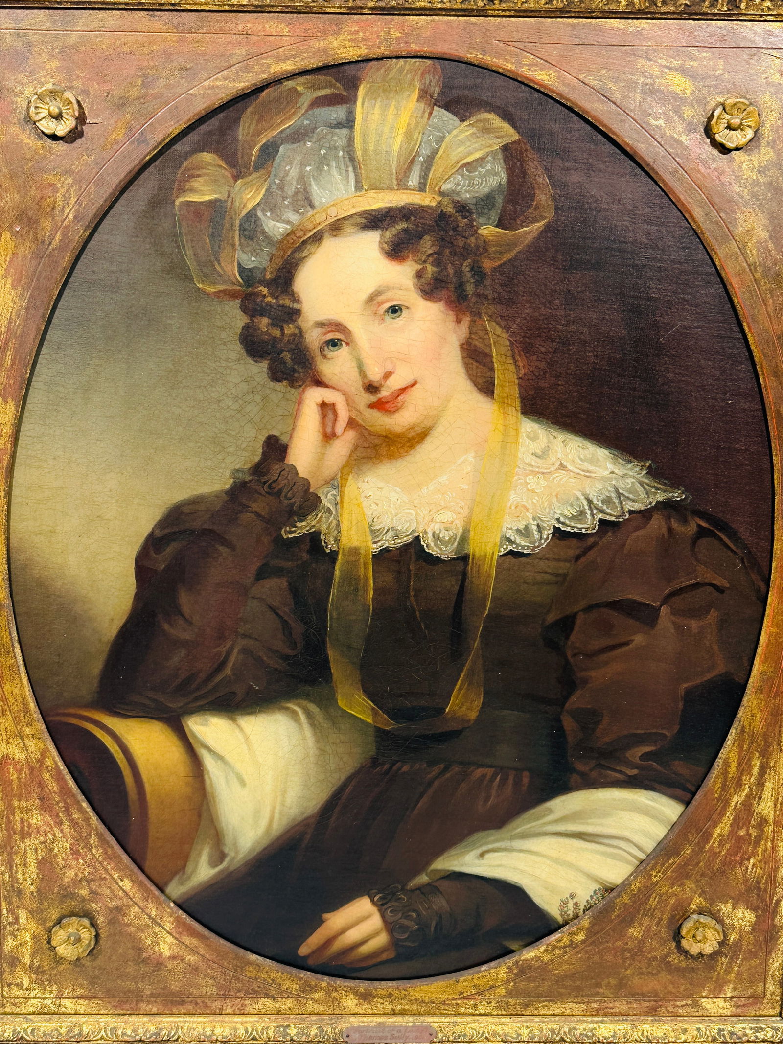 Christie's Label: A Painting of a Lady, Possibly Thomas Sully: Oil on canvas, 30.1/4 in. x 25 in. for the painting, 38.1/4 in. x 33.1/4 in. for the frame.