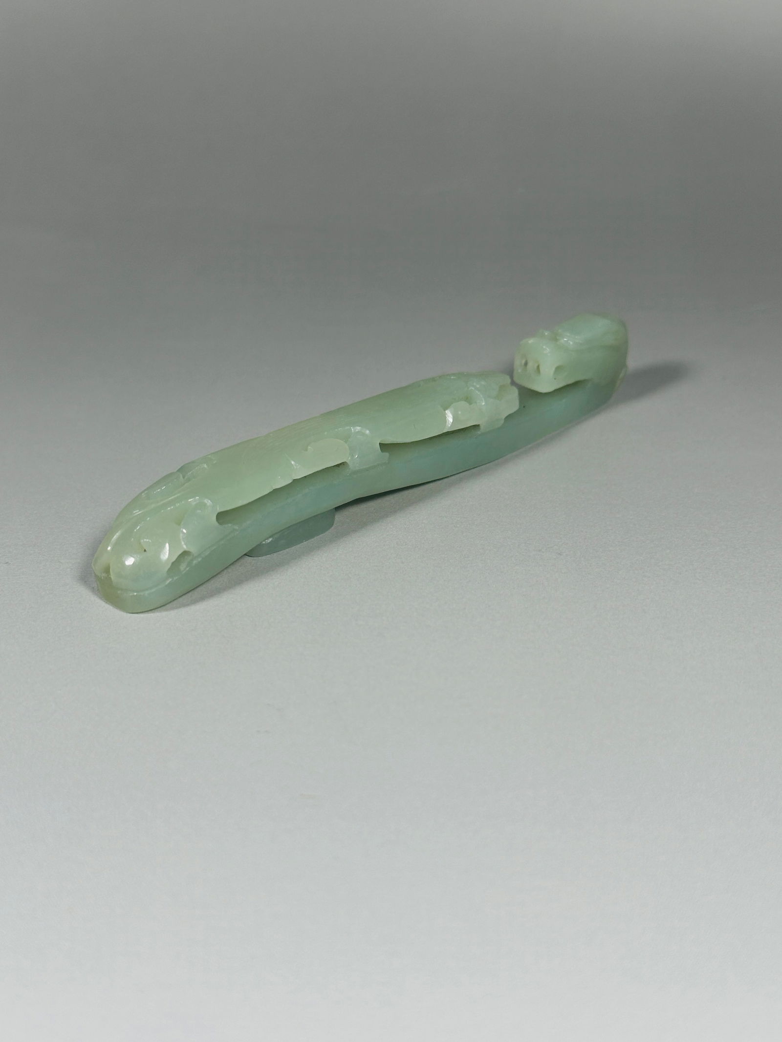 A Chinese Pale Celadon Carved Jade 'Dragon' Belt Hook (1 of 7)