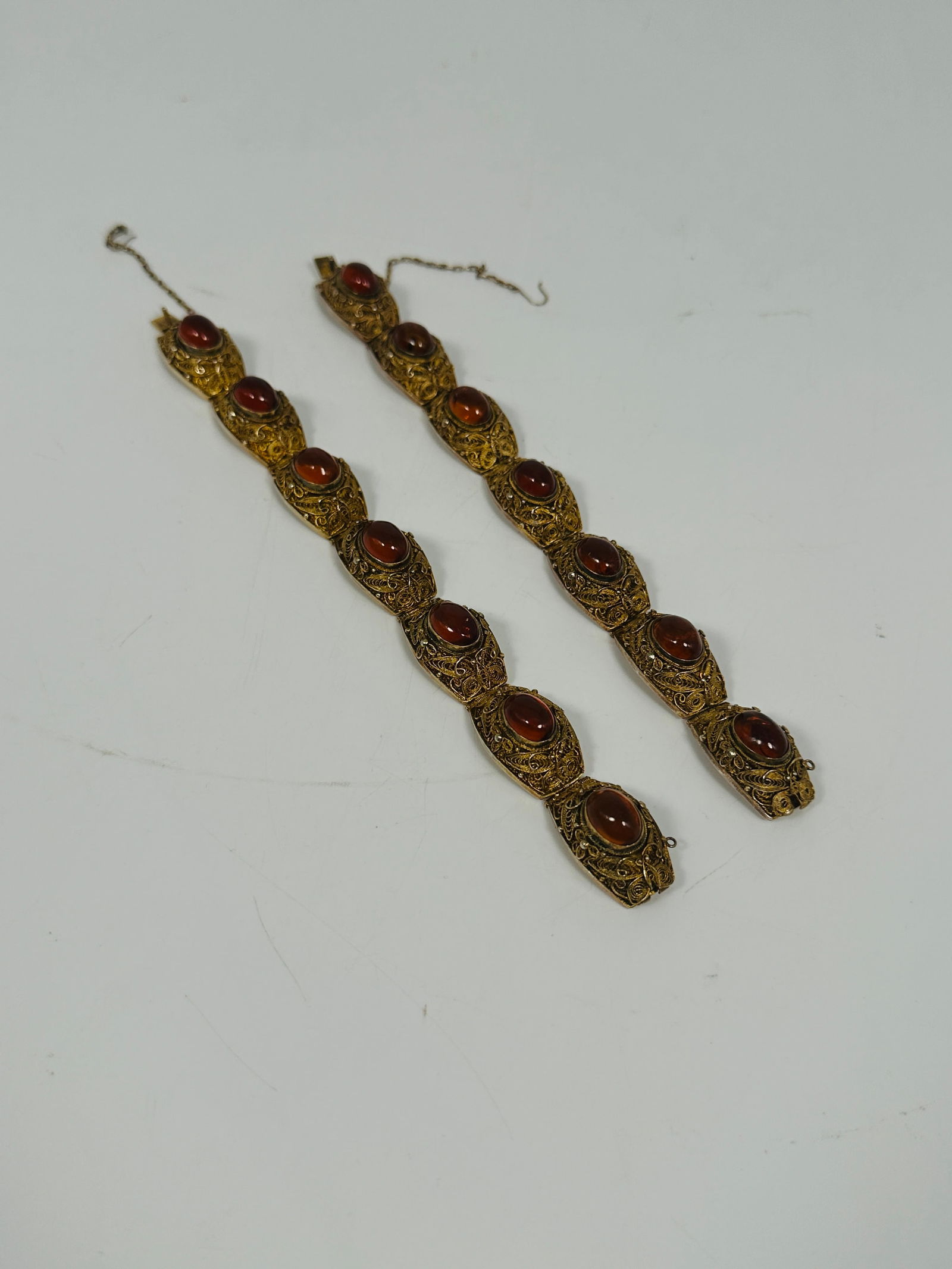 A Pair of Red Gem Inlaid Sterling Silver Bracelets (1 of 7)