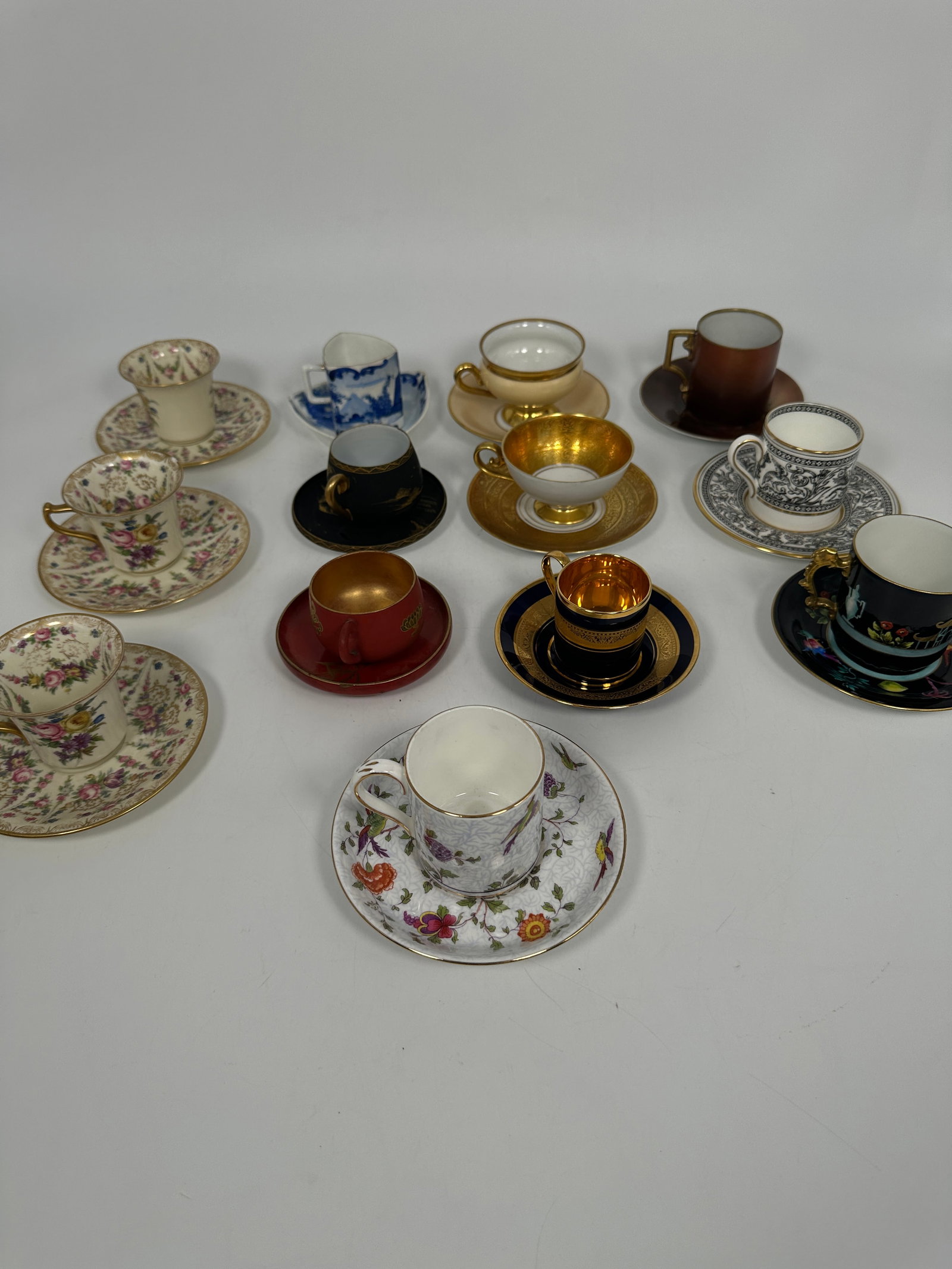 A Group of Thirteen Set of Tea/Coffee Cups and Saucers: Comprising a set of Bavaria Tirschenreuth Germany cup and saucer; a set of Wedgwood Bone China England Florentine cup and saucer; three sets of Rosenthal 'Ivory' Bavaria Santa Rosa cups and saucers; a