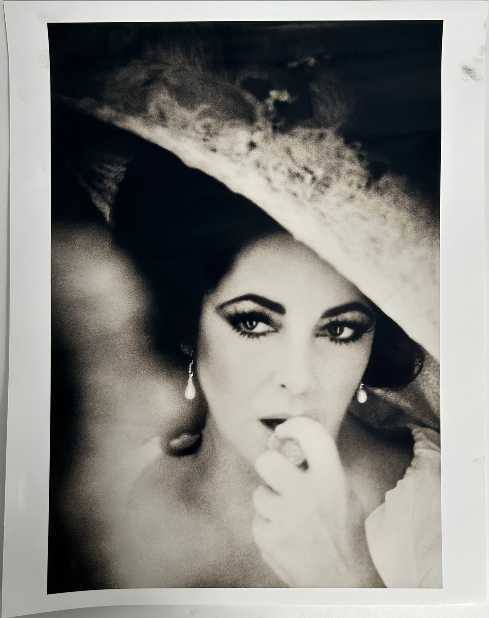 A Photo Print of Elizabeth Taylor, Vienna, 1976: A copy of photo print of Elizabeth Taylor, Vienna, 1976, originally shot by Firooz Zahedi, 20.1/4 in. x 16 in. A comparable lot please see Elizabeth Taylor, Vienna, 1976, Christie's New York: Photogra