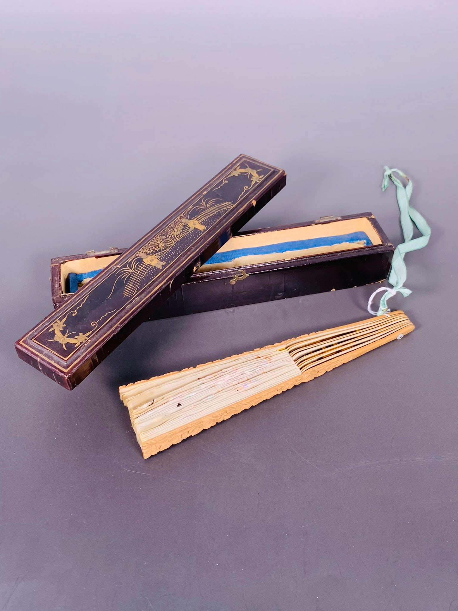 A Chinese Embroidered Silk Fan with a Fitted Gilt-Lacquered Box (1 of 12)