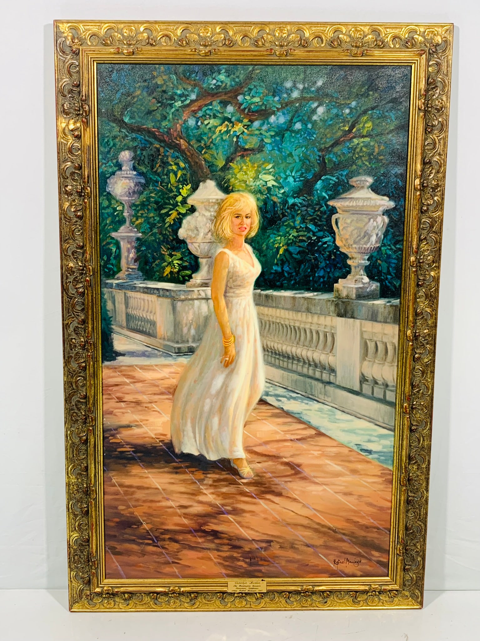 A Painting of Carolyn Marlen in A Garden Scene, Signed by Rafael Maniago: Large painting depicting a woman posing in a white dress against a scenic backdrop. A brass plaque is affixed, inscribed with "Carolyn Marlen", "The Huntington Gardens", "Pasadena, California", and "R