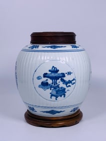 A Chinese Blue and White Lobed 'Medallion' 'Antiques' Jar and a Wood Cover
