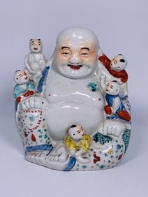 A Chinese Famille Rose Figure of Seated Budai, Republic Period, You Longsheng Mark