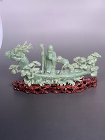 A Chinese Carved Jadeite Group of Shoulao, Crane, and Dragon Boat
