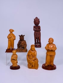 A Group of Six Chinese Carved Wood Figures