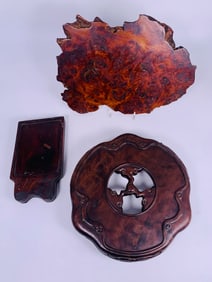 A Group of Three Chinese Wood Stands