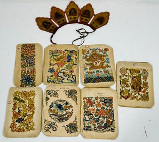 A Buddhist Priest's Lacquered Wooden Crown and Seven Chinese Embroidered-Paper Panels