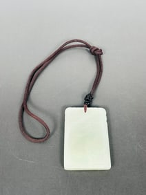 A Chinese White Jade Plaque, Zigang Mark