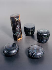A Group of Five Chinese Small Mother-of-Pearl-Inlaid Black Lacquer Boxes and Covers