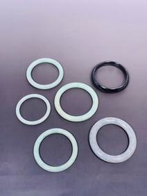 A Group of Six Chinese Jadeite/Stone Bangles