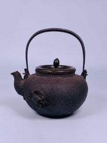 A Japanese Cast-Iron Teapot and Cover, Ryubundo Mark