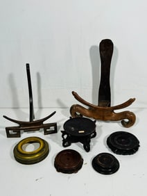 A Group of Eight Chinese Stands and Eight Coins