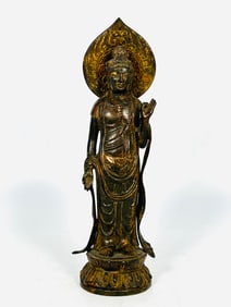 An Asian Gilt-Bronze Figure of Standing Buddha