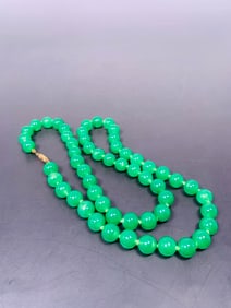 A String of Chinese Green Jade Beads, Necklace