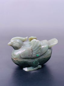 A Chinese Carved Celadon Jade Bird-Shaped Box and Cover