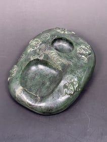 A Chinese Carved Spinach-Green Jade Inkwell