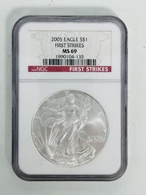 A US 2005 Eagle $1 First Strikes 1oz Fine Silver Coin, NGC MS69