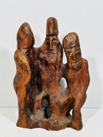 A Carved Wood Figural Group
