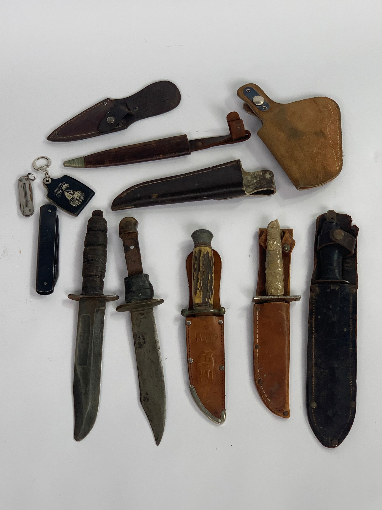 A Group of Seven Knives and Four Leather Sheaths/Cases (1 of 16)