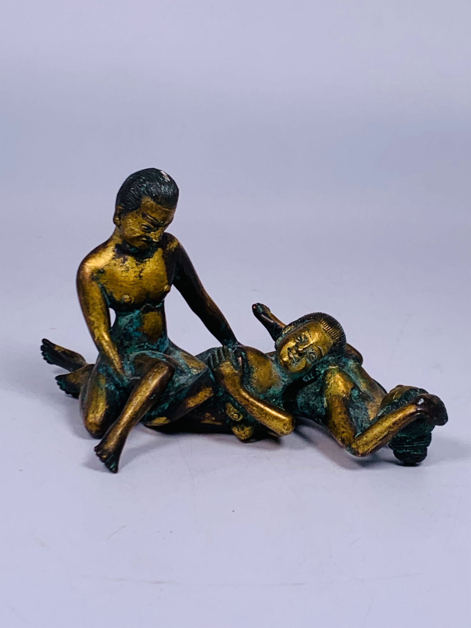 A Kama Sutra Erotic Bronze Figural Group: 3.1/4 in. high, 6 in. wide.