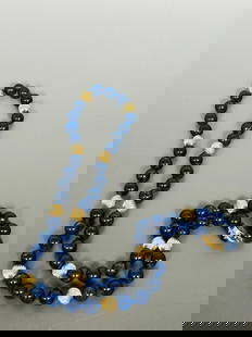 A Vintage String of Lapis Lazuli and Gold Beads, Necklace: An illegible mark to the clip, 29 in. long for the necklace.