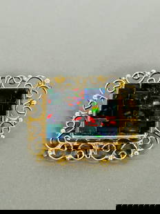 A Vintage 14K Gold and Opal Brooch: 14K' mark to one side. 1.1/8 in. long, 1 in. wide.