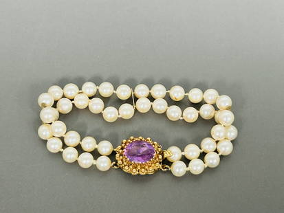A Vintage 14K Gold, Amethyst and Pearl Bracelet: 14K' mark to the clip, 7.3/4 in. long.