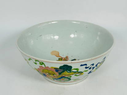 A Chinese Large Famille Verte 'Buddhist Lions' Bowl: 4.1/2 in. high, 10.1/2 in. diam.