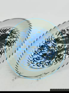 A Chinese Blue and White 'Dragon' Dish: The interior is centered with a five-clawed dragon in pursuit of a flaming pearl, enclosed within a double-line border. The exterior features two dragons similarly depicted in pursuit of flaming pearl