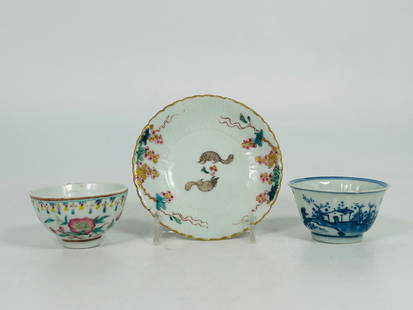 A Group of Three Chinese Small Porcelain Ware: Comprising a famille rose molded 'mouse' dish, 1 in. high, 4.1/4 in. diam.; a famille rose cup, 1.1/2 in. high, 2.5/8 in. diam.; and a blue and white cup, 1.1/2 in. high, 2.3/4 in. diam.