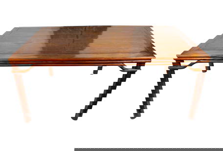 A Chinese Large Huanghuali Rectangular Table: The smooth top panel is set within a rectangular frame, supported by thick, straight legs of rounded circular section, joined just beneath the apron by humpback stretchers. 32.3/4 in. high, 78.1/2 in.