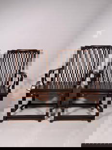 Doyle Provenance: A Pair of Chinese Hongmu Spindle Back Armchairs: Each of square form, featuring an 'official's hat' top rail and spindle-form backs. 39.1/4 in. high, 22 in. wide, 17.1/2 in. deep each. Provenance: The Estate of Herbert Kasper; Doyle, 27 March 2024,