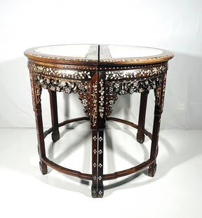 A Pair of Chinese Marble-Inset Mother-of-Pearl-Inlaid Console Tables, Late Qing Dynasty: 34 in. high, 40 in. wide, 20 in. deep each.