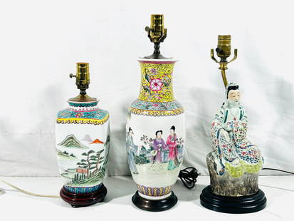 A Group of Three Chinese Famille Rose Porcelain Objects: All mounted as lamps. Comprising a 'figural' vase, 19 in. high, 6 in. wide overall; a 'landscape vase', 14.1/2 in. high, 5.1/4 in. wide; and a figure of Guanyin, 17.1/4 in. high, 6.1/2 in. wide overal